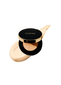 A cushion foundation product with a sponge applicator, predominantly in a light beige color, with a black and gold lid labeled 'VINNE'. VINNE Cushion Foundation #21 Light Beige for flawless glass skin finish