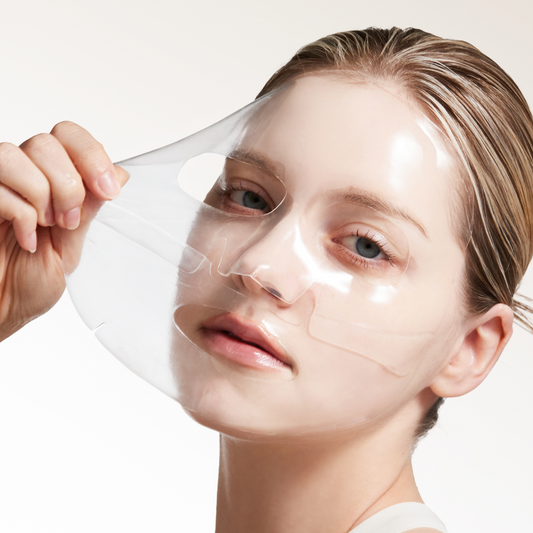 A model with radiant skin holding VINNE Cushion Foundation, illustrating how a collagen mask creates an elastic base for improved cushion longevity and a flawless finish