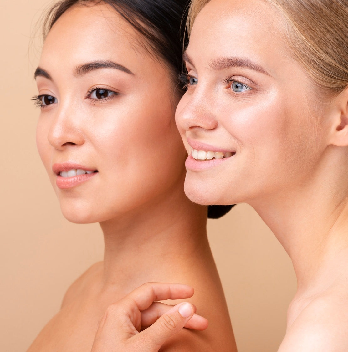 Two women looking at the same place