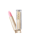 A clear pink lip balm with a golden twist cap, displayed against a white background.